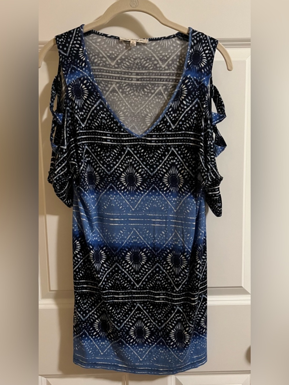EUC Indigo Thread cold shoulder with a twist pretty blue tunic. Size M